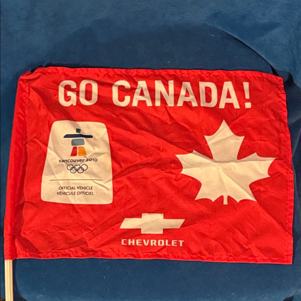 Olympic Red Go Canada Flag with Maple Leaf and Chevrolet Logo